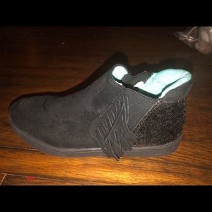 Black fringe slip on sneaker